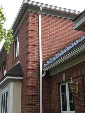 Gutter attached to Brick